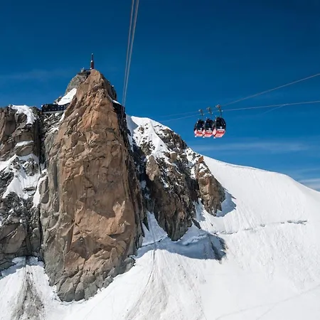 Apartment Le Parc Du Mont Blanc In | Balcony & Mountain Views - Happy